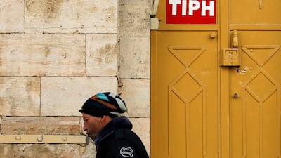 A sign of the Temporary International Presence in Hebron (TIPH) on its office in Hebron, in the Israeli-occupied West Bank. Reuters