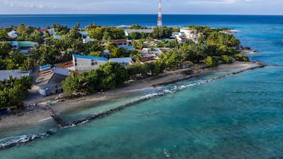 Concrete blocks on the shore to try to prevent further coastal erosion in Mahibadhoo, Maldives. All of the country's islands are low-lying. Carl Court / Getty Images