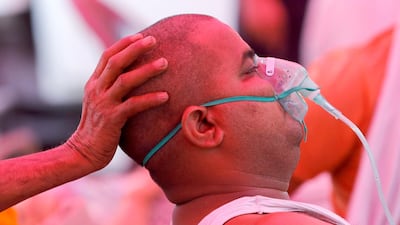 A man with a breathing problem receives oxygen support for free at a Gurudwara (Sikh temple), amidst the spread of coronavirus disease, in Ghaziabad, India. Reuters