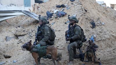 Israeli specialist operatives on the ground in the Gaza Strip. The armed forces have developed a 'hammer' tactic in which they reduce Hamas strongholds to rubble to avoid solider casualties, but this has significantly increased civilian deaths. AFP