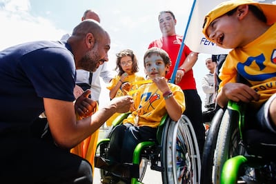 Manchester City manager Pep Guardiola, left, at one of the Cruyff Foundation events. Image courtesy of Cruyff Foundation