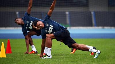 Manchester United players Jesse Lingard (R) and Marcus Rashford (L) warm up during their team’s training session at the Olympic Sports Center in Beijing, China, 24 July 2016. How Hwee Young / EPA