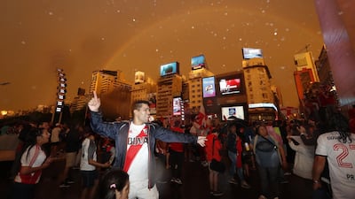River Plate fans celebrate their team's victory in the final of the Copa Libertadores, in Buenos Aires. EPA