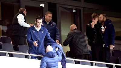 Tottenham Hotspur's Gareth Bale watches the match from the stands. PA