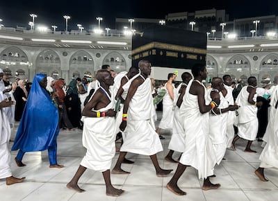 Pilgrims in ihram clothing during Hajj. AFP