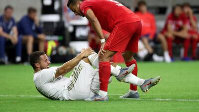 It was a tough opening night for Eden Hazard, left, in Real Madrid colours. Reuters