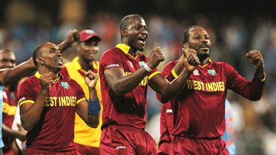 West Indies players celebrate after their seven wicket win over India in the World Twenty20 semi-final. Rafiq Maqbool / AP Photo