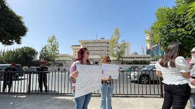 Two of the three protestors outside the parliament building in central Amman. Khaled Yacoub Oweis, The National.