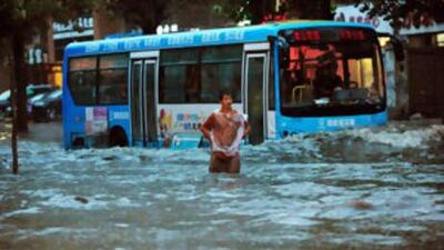 A heavily flooded street in Shenyang, China's northeast Liaoning province today.