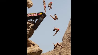 This multi-layered composite image shows diver Blake Aldridge, of the UK, diving from the 27m high take-off board during the first round.