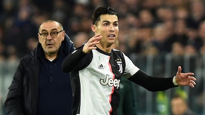Cristiano Ronaldo and Juventus coach Maurizio Sarri during the game. Reuters