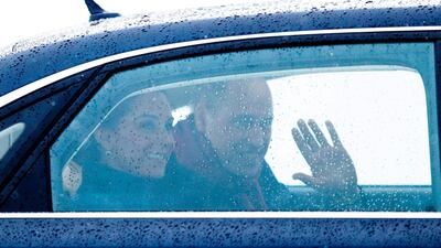 Britain's Catherine, Duchess of Cambridge, left, and Prince William, Duke of Cambridge wave as they arrive at Gardermoen Air Force Base north of Oslo. Cornelius POPPE / AFP