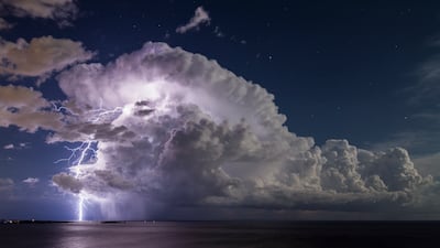 Serge Zaka captured this thunderstorm as a full moon shone over the famous Bay of Cannes in the south of France.