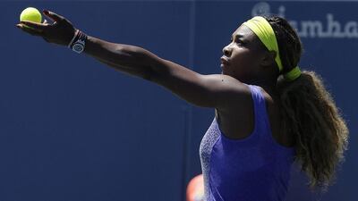 Serena Williams prepares to serve during her semi-final victory over Andrea Petkovic during the Stanford WTA tournament on Saturday. Jeff Chiu / AP / August 2, 2014