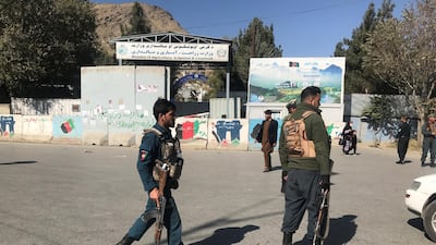Afghan policemen keep watch near the site of an attack in Kabul, Afghanistan. Reuters