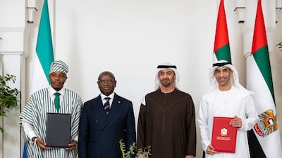 Sheikh Mohamed with Mr Bio, Dr Al Thani and Mr Sesay, after the signing of the Cepa. Ryan Carter / UAE Presidential Court