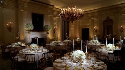 Tables for the State Dinner for French President Emmanuel Macron are shown in the State Dining Room of the White House in Washington, US, April 23, 2018. Joshua Roberts / Reuters