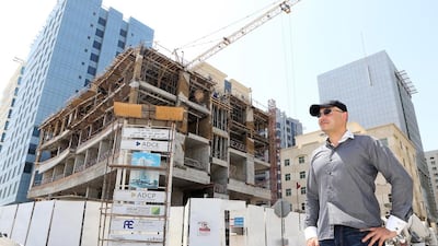 Cyrus Hodes at a building site in Al Nahyan, Abu Dhabi, where the robot parking system will be integrated into the building’s structure. ParkPlus, the operator, says the system is a first for the GCC. Pawan Singh / The National