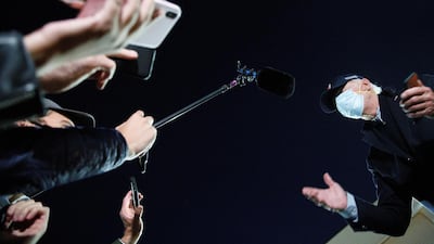 US Democratic presidential candidate Joe Biden speaks to journalists before boarding his campaign plane following campaign stops, at the Detroit Metropolitan Wayne County Airport in Romulus, Michigan. Reuters