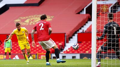 Joe Bryan heads home for Fulham to make it 1-1 at Old Trafford. PA