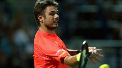 DUBAI, UNITED ARAB EMIRATES - FEBRUARY 27: Stan Wawrinka of Switzerland in action against Marcos Baghdatis of Cyrus in the final of the ATP Dubai Duty Free Tennis Championship at the Dubai Duty Free Stadium on February on February 27, 2016 in Dubai, United Arab Emirates. (Photo by Warren Little/Getty Images)