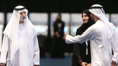 Sheikh Nahyan bin Mubarak, Minister of Youth, Culture and Community Development is greeted at the voting station inside ADNEC in Abu Dhabi. Delores Johnson / The National