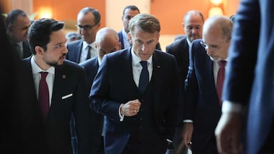 France's President Emmanuel Macron with Jordan’s Crown Prince Hussein at the MED9 summit. AFP