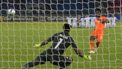Ivory Coast forward Wilfried Bony, right, misses his penalty during the shootout against Ghana in the Africa Cup of Nations final on Sunday. Ivory Coast missed their first two shots, before Ghana missed their third and fourth shots, and the Ivorians eventually won the shootout 9-8. Khaled Desouki / AFP