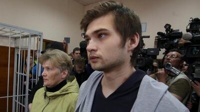 Ruslan Sokolovsky, attends court after being accused of playing Pokemon Go inside an Orthodox church. He is pictured with his mother Yelena Chingina in Yekaterinburg, Russia on May 11, 2017. Alexei Kolchin / Reuters