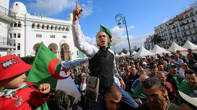 A demonstrator gestures as he shouts slogans during a protest against the country's ruling elite and rejecting December presidential election in Algiers, Algeria. Reuters