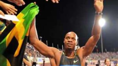 Jamaica's Asafa Powell celebrates after his victory in the 100m final.