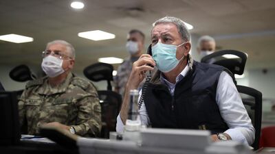 The Turkish Defence Minister, Hulusi Akar, and army commanders after cross-border air strikes against Kurdish rebel targets in northern Iraq. AFP