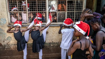 Young dancers warm up for an annual Christmas ballet in a settlement in Nairobi, Kenya. AFP