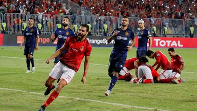Al Ahly's Amr Al Sulaya celebrates after teammate Walid Soliman scores the third goal in the African Champions League final first leg. Reuters
