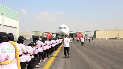 Dubai Police break a Guinness World Record by pulling an Emirates Boeing 777 plane 100 metres. Courtesy Dubai Police