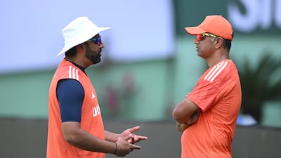 India captain Rohit Sharma talks to coach Rahul Dravid in Visakhapatnam. Getty Images