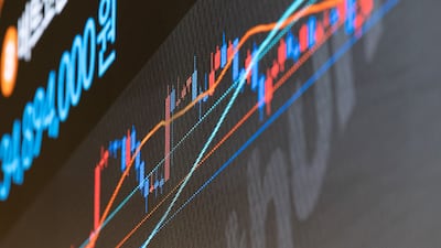 The Bitcoin price chart at the Bithumb exchange office in Seoul, South Korea. Bloomberg