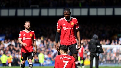 Cristiano Ronaldo goes down with an injury in front of Paul Pogba. Getty