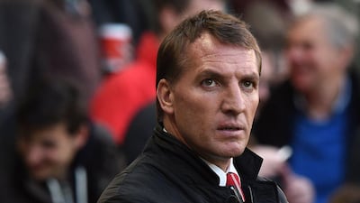 Brendan Rodgers has revealed his ambitions of strengthening the Liverpool squad this summer. Paul Ellis / AFP