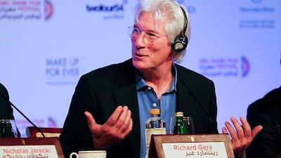 Richard Gere with his cup of tea at the Arbitrage press conference at Emirates Palace. Sarah Dea / The National