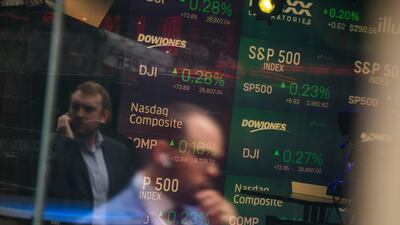 Pedestrians are reflected in a window at the Nasdaq MarketSite in the Times Square area of New York. with so much volatility, central bankers and investors have little chance of accurately calibrating the correct level for interest rates, bonds and for stocks. Bloomberg