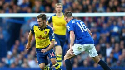 Arsenal will be without the suspended Aaron Ramsey, left, when they host Besiktas in their Uefa Champions League qualifying match on Wednesday. (Photo by Clive Brunskill/Getty Images)