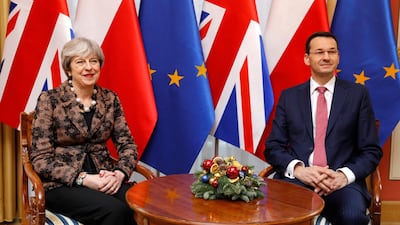 Poland’s Prime Minister Mateusz Morawiecki meeting with Britain’s Prime Minister Theresa May. Kacper Pempel/ Reuters