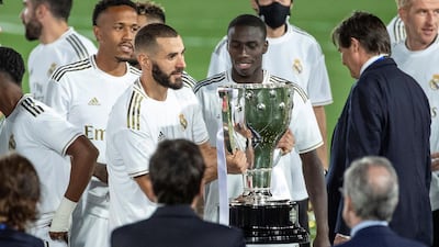 Real Madrid's Karim Benzema with the La Liga trophy. EPA