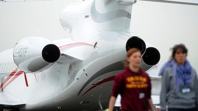 A Dassault Falcon airplane is moved on the tarmac at the Paris International Air Show. Antoine Antoine for The National