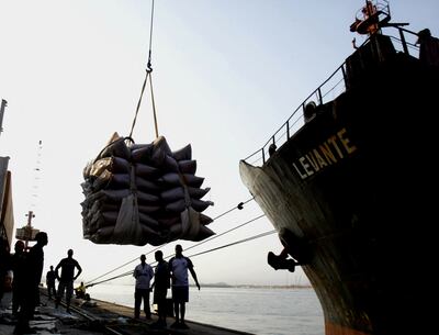 A crane lifts sugar sacks on the docks at Brazil's main ocean port, in Santos. The Emirates are today the main destination of Brazilian products among Arab countries. Reuters