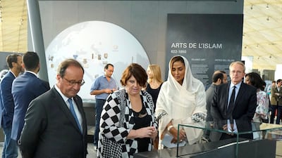President Francois Hollande, Princess Lamia Bint Majid AlSaud, and Ms. Yannick Lintz during the opening of the newly expanded spaces in the museum’s Department of Islamic Art. Courtesy Alwaleed Philanthropies