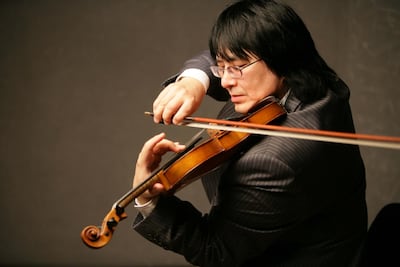 Kazakh violinist Marat Bisengaliev, music director of the orchestra. NCPA/SOI