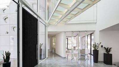 The villa comes with an elevated entrance with high ceilings over three floors and direct access onto a private beach. Courtesy Knight Frank