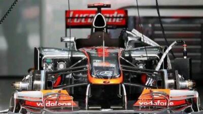 Jenson Button's McLaren shows its complex internal design while sitting in the team garage before the Bahrain Grand Prix this year. Mark Thompson / Getty Images